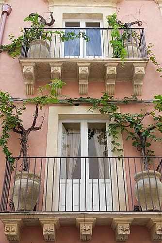 Noto, Sicily. Charming old window and terrace on a home. Art Print